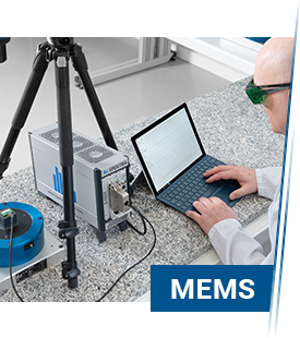 Measurement technician at the test station to check a MEMS sensor on a vibration exciter