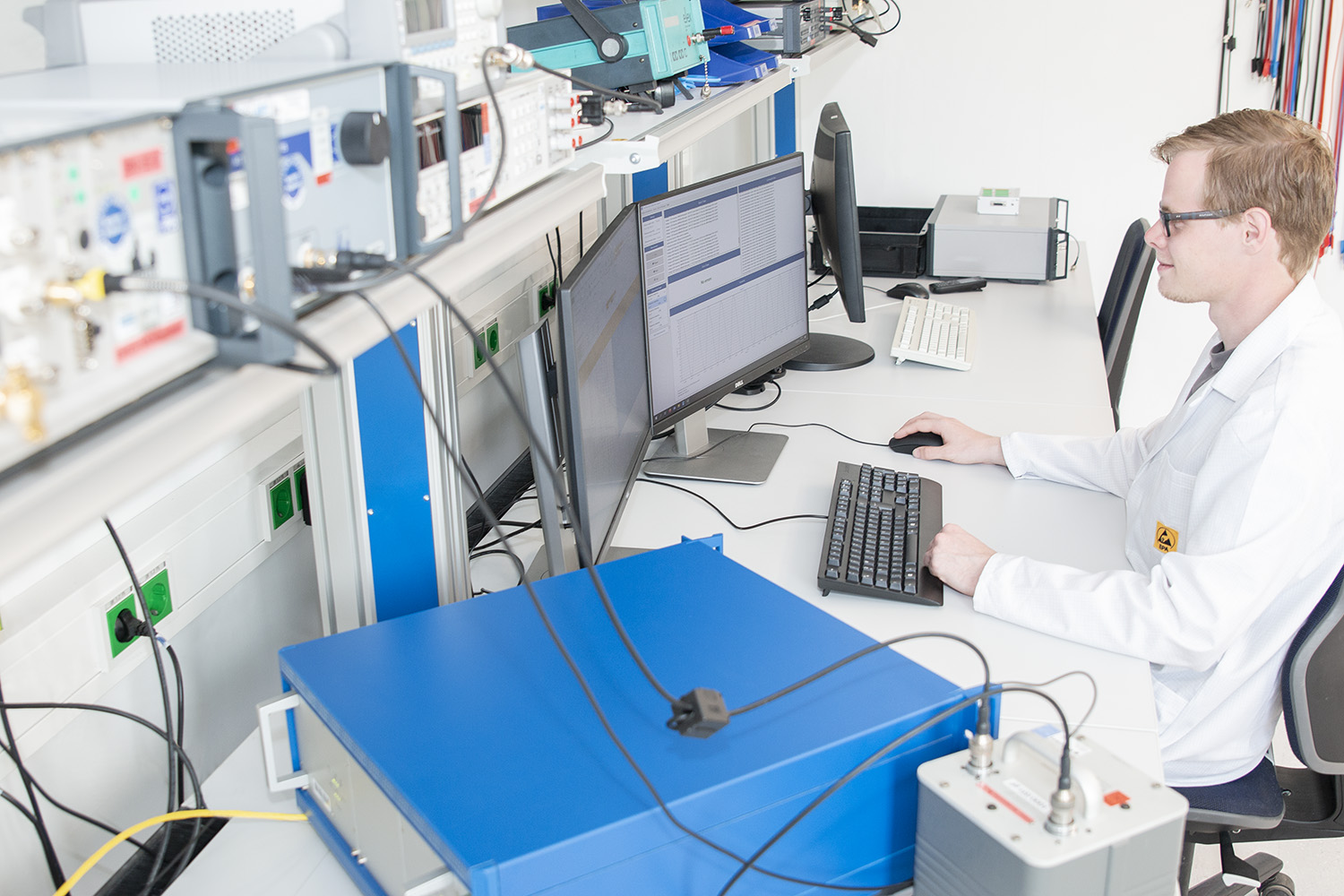 A SPEKTRA technician in the electrical calibration laboratory.
